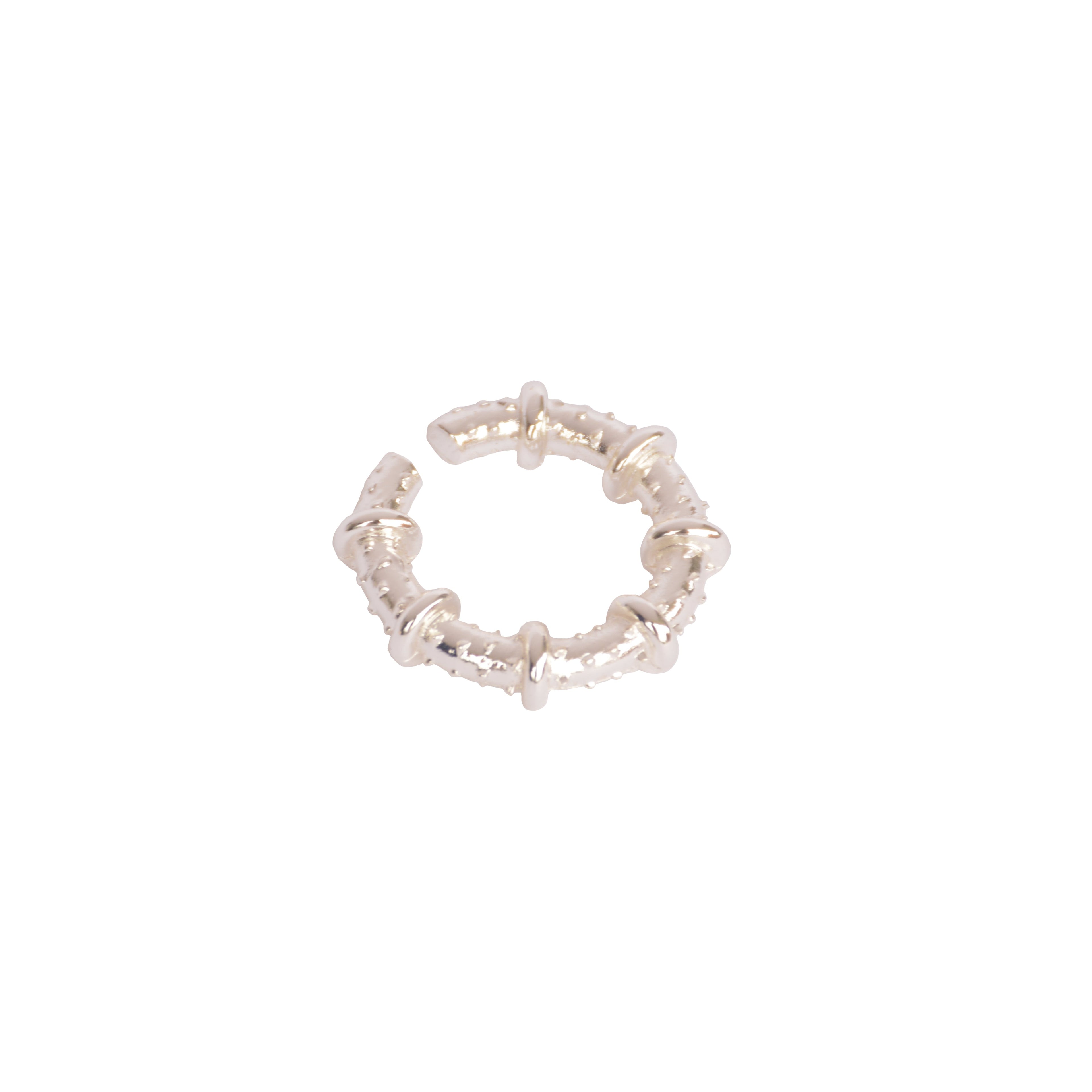 Earcuff maximalista a presión en bronce con baño de plata 925.