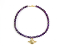 Collar saturno gold bronce baño de oro 24K.