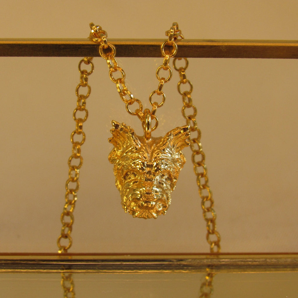 Collar perro Yorkie bronce baño de oro 24k.