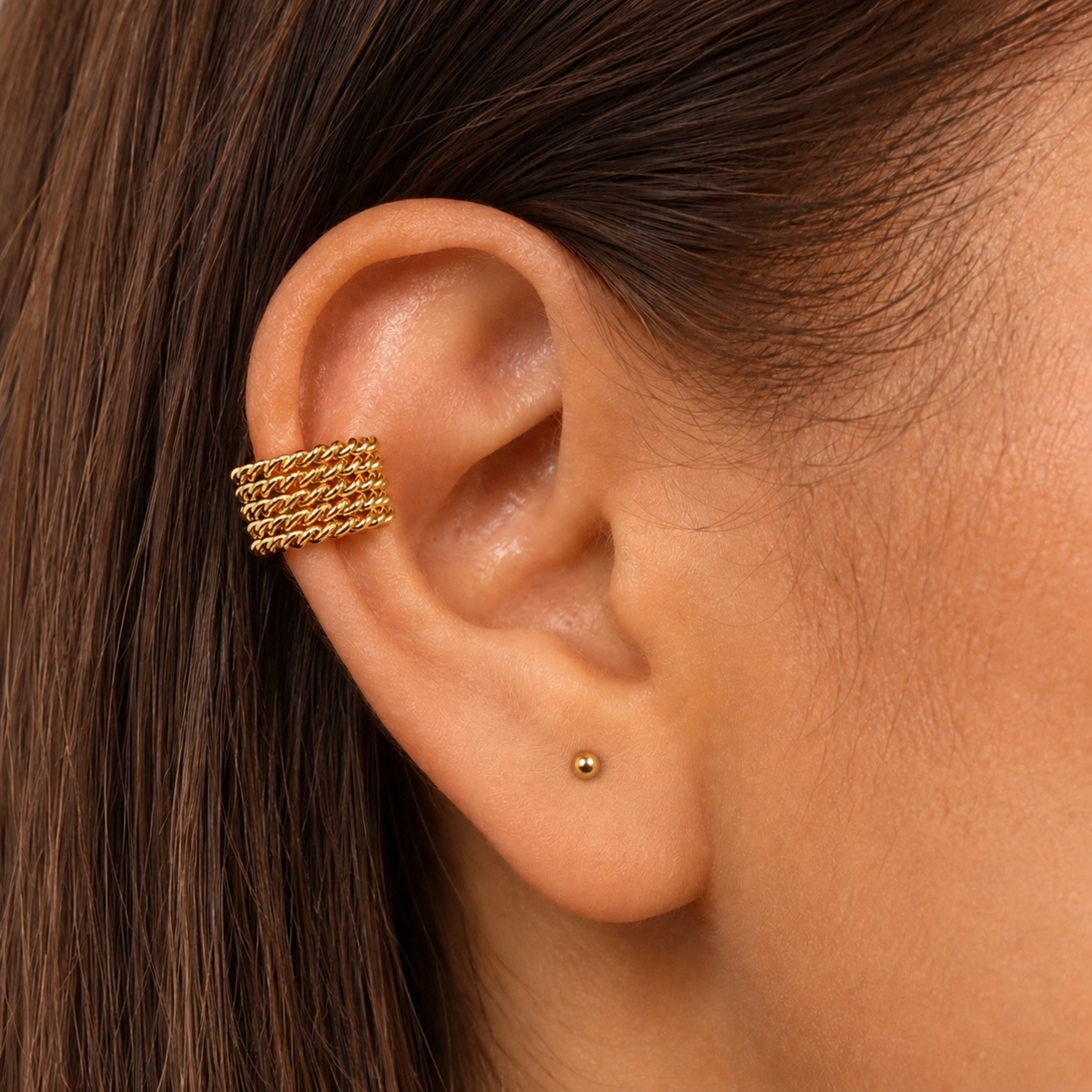 Earcuff a presión con diseño entorchado texturizado en bronce con baño de oro de 24K de Polen wear