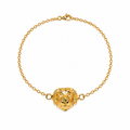 Pulsera de eslabones en bronce con baño de oro de 24K y dije de perro Golden de Polen wear.